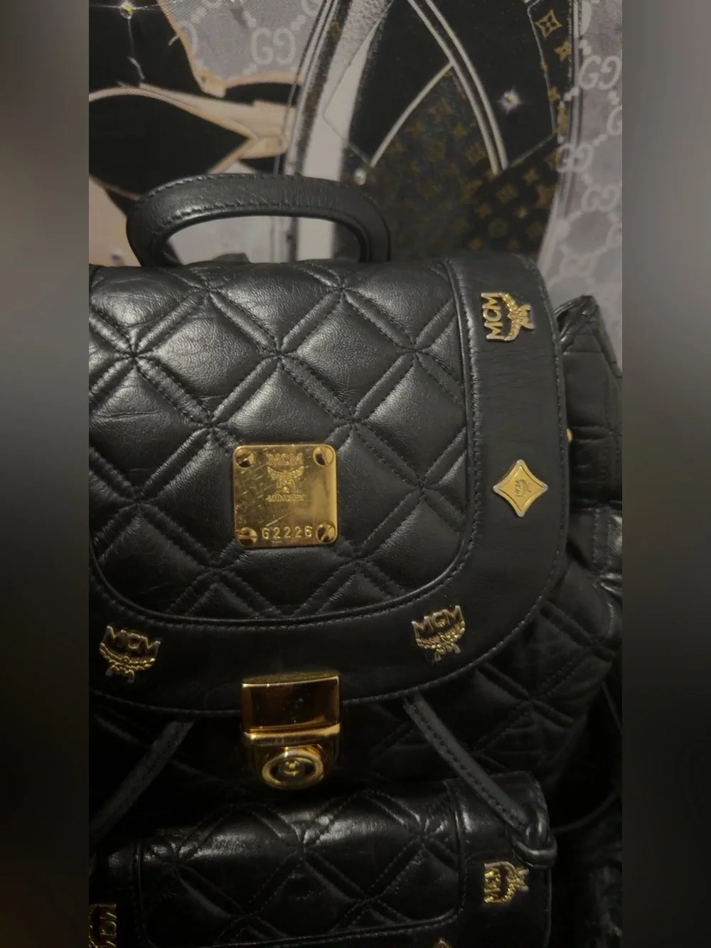 MCM Black Quilted Leather Backpack with Gold Hardware Accents